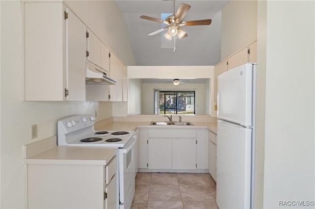 kitchen with white appliances, white cabinetry, lofted ceiling, and sink