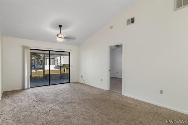 carpeted empty room featuring ceiling fan and lofted ceiling