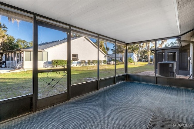 unfurnished sunroom with a wealth of natural light