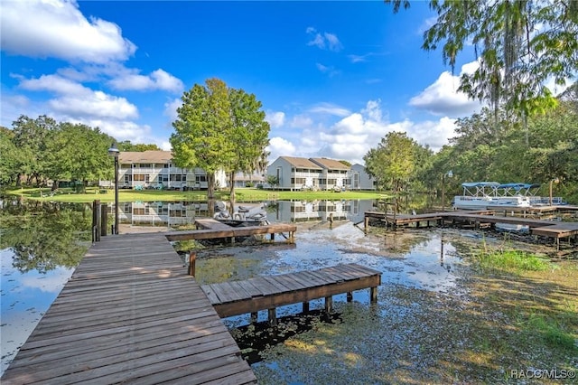 view of dock with a water view