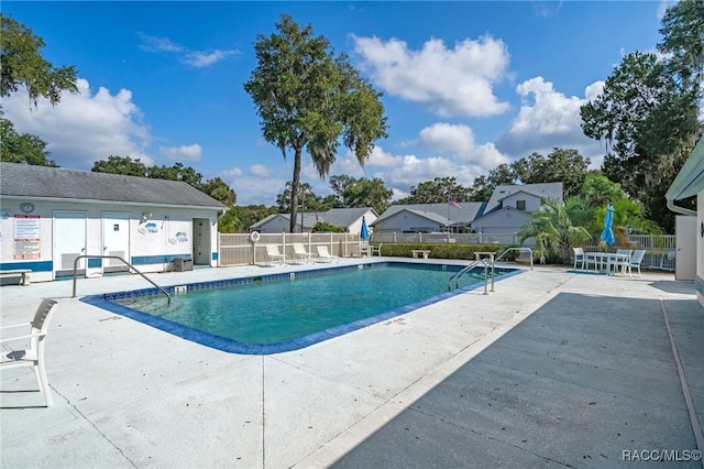 view of pool with a patio