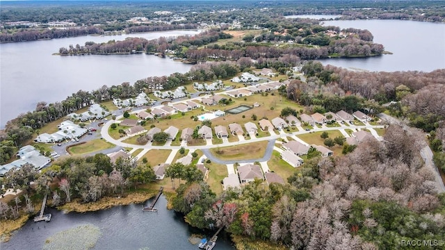 bird's eye view with a residential view and a water view