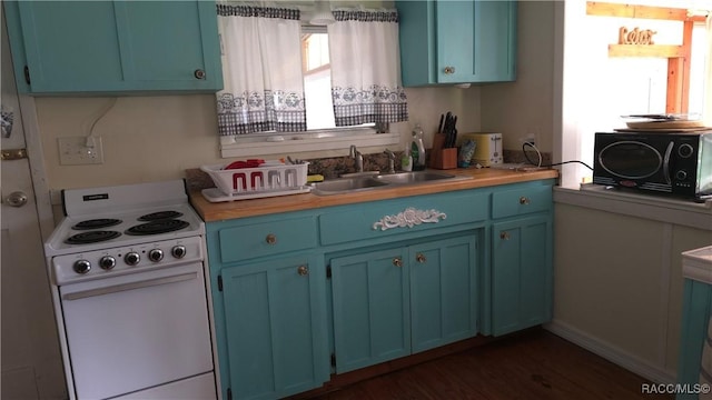 kitchen featuring sink, blue cabinets, dark hardwood / wood-style floors, and white electric range