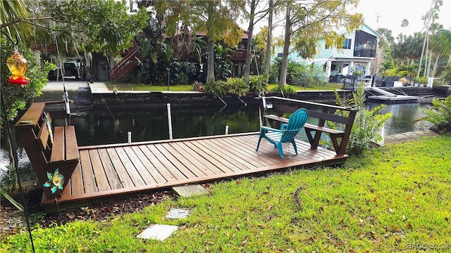 view of dock with a water view