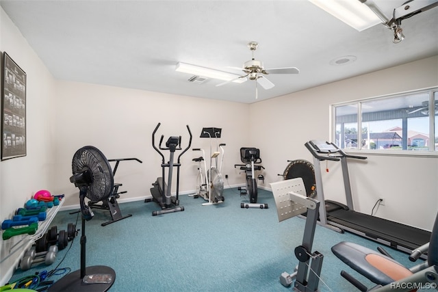 exercise room with ceiling fan