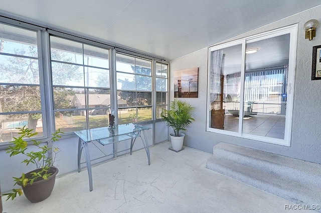 sunroom / solarium with a healthy amount of sunlight