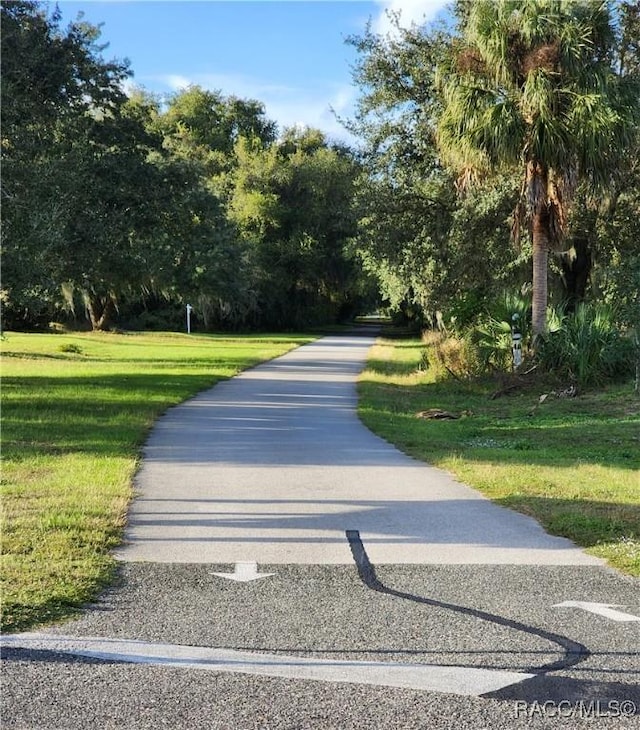 surrounding community with a lawn