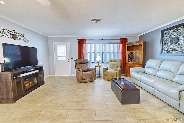 living room with ornamental molding