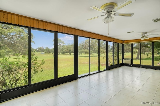 8831 E Sandpiper Dr, Inverness, FL 34450 - unfurnished sunroom with a ceiling fan