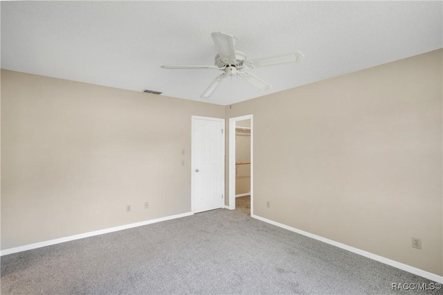 8831 E Sandpiper Dr, Inverness, FL 34450 - empty room with ceiling fan, carpet floors, and baseboards