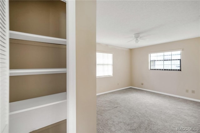 8831 E Sandpiper Dr, Inverness, FL 34450 - carpeted spare room featuring ceiling fan, healthy amount of natural light, and baseboards