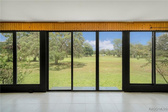 8831 E Sandpiper Dr, Inverness, FL 34450 - entryway with healthy amount of natural light and tile patterned floors