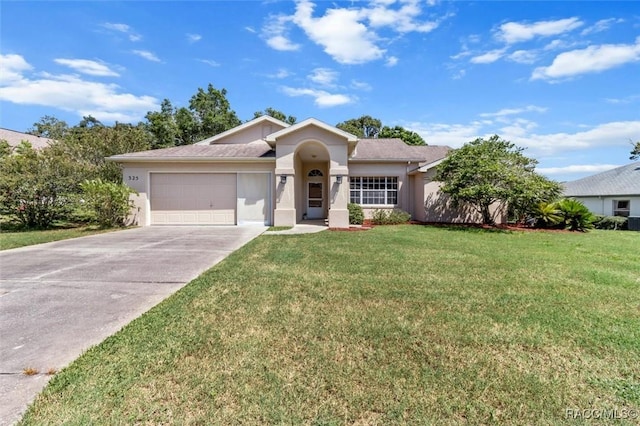 single story home featuring a front yard and a garage