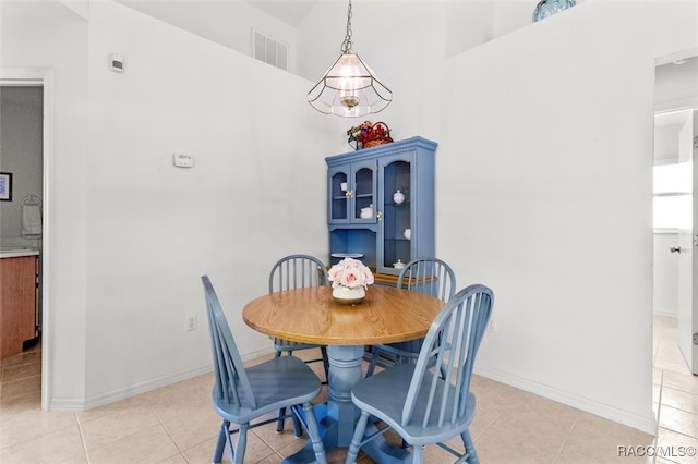 view of tiled dining space