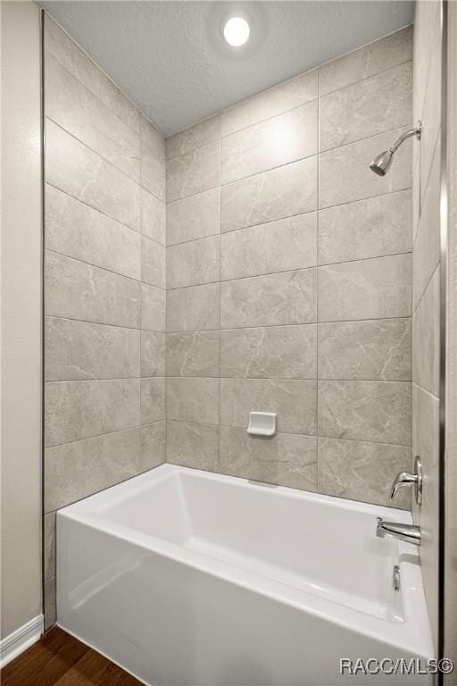5235 N Sonora Ter, Beverly Hills, FL 34465 - bathroom featuring wood finished floors and  shower combination