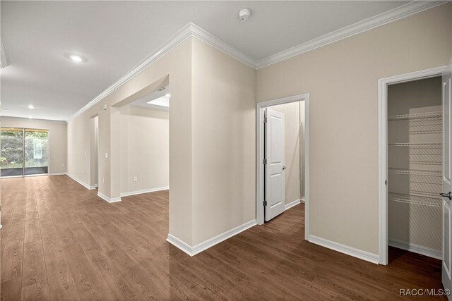 5235 N Sonora Ter, Beverly Hills, FL 34465 - hall with wood finished floors, ornamental molding, and recessed lighting