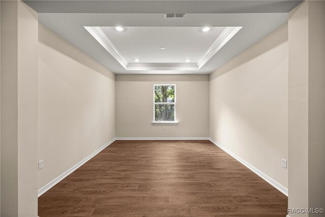 5235 N Sonora Ter, Beverly Hills, FL 34465 - unfurnished room with ornamental molding, a tray ceiling, wood finished floors, and recessed lighting