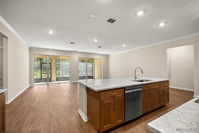 5235 N Sonora Ter, Beverly Hills, FL 34465 - kitchen with dishwasher, open floor plan, ornamental molding, healthy amount of natural light, and a center island with sink
