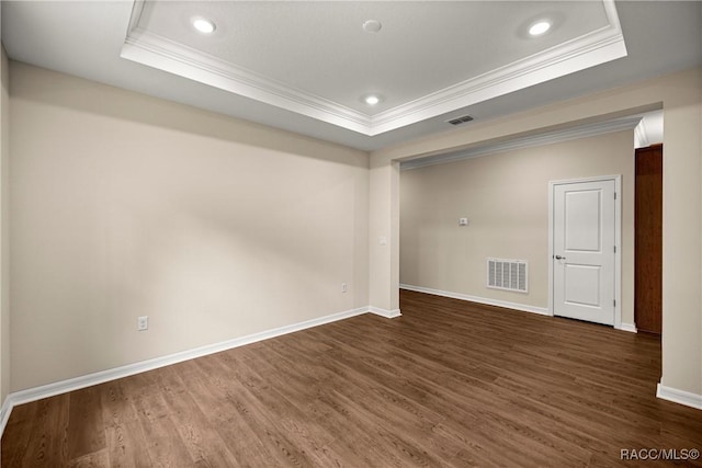5235 N Sonora Ter, Beverly Hills, FL 34465 - spare room featuring a raised ceiling, crown molding, dark wood-style flooring, and recessed lighting
