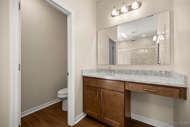 5235 N Sonora Ter, Beverly Hills, FL 34465 - full bath with a shower stall, wood finished floors, and vanity