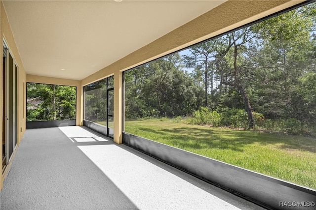5235 N Sonora Ter, Beverly Hills, FL 34465 - unfurnished sunroom featuring view of scattered trees