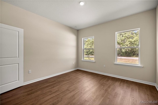 5235 N Sonora Ter, Beverly Hills, FL 34465 - unfurnished room featuring dark wood finished floors and baseboards