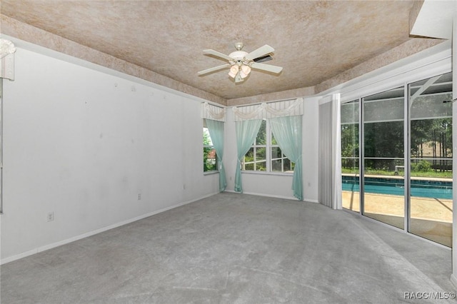 empty room featuring ceiling fan