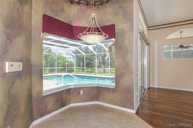 view of swimming pool featuring ceiling fan