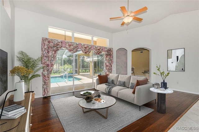 living room with hardwood / wood-style floors and ceiling fan