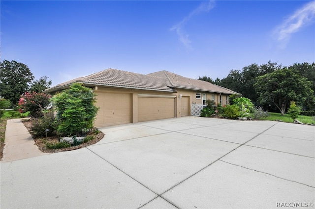 view of front of home featuring a garage