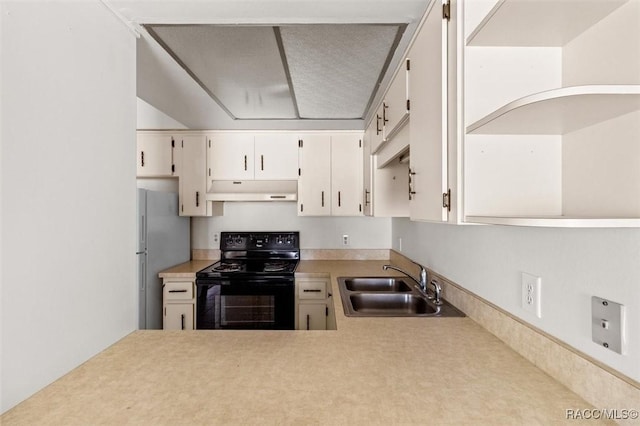 kitchen with white cabinetry, black electric range oven, fridge, and sink