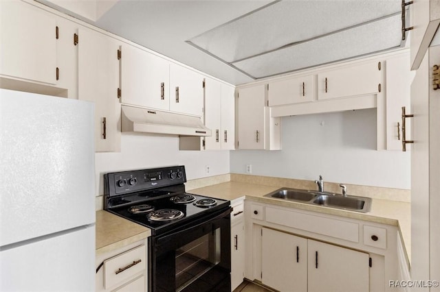 kitchen with white cabinetry, black electric range oven, sink, and white fridge