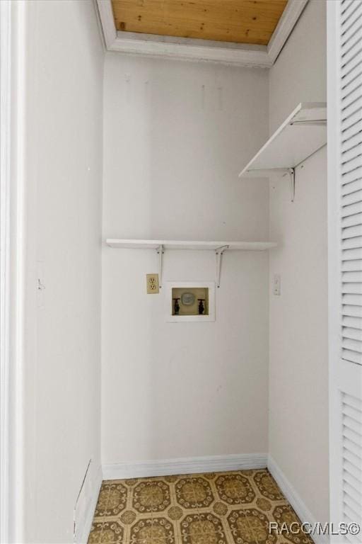 laundry room featuring crown molding, tile patterned floors, wood ceiling, and hookup for a washing machine