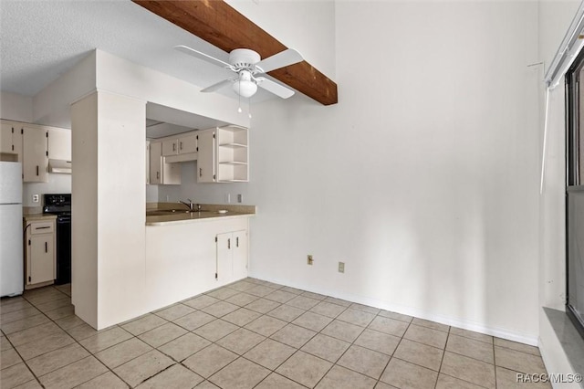 kitchen with electric stove, light tile patterned flooring, ceiling fan, and white fridge