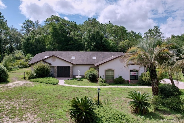 view of front of property with a front lawn