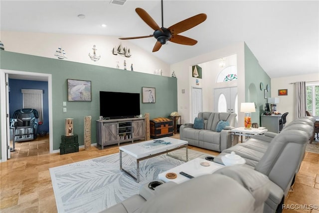 living room featuring ceiling fan and high vaulted ceiling