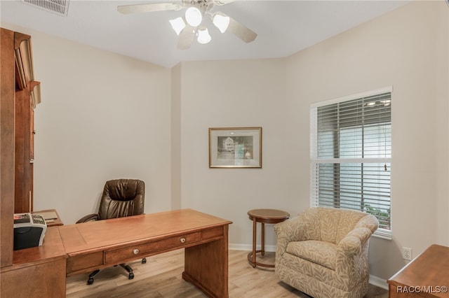 office space with ceiling fan and light wood-type flooring