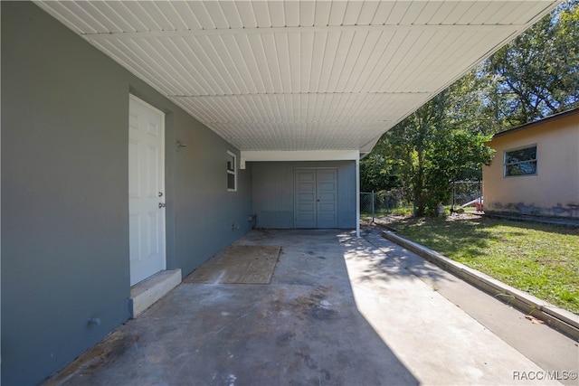 view of patio featuring a carport