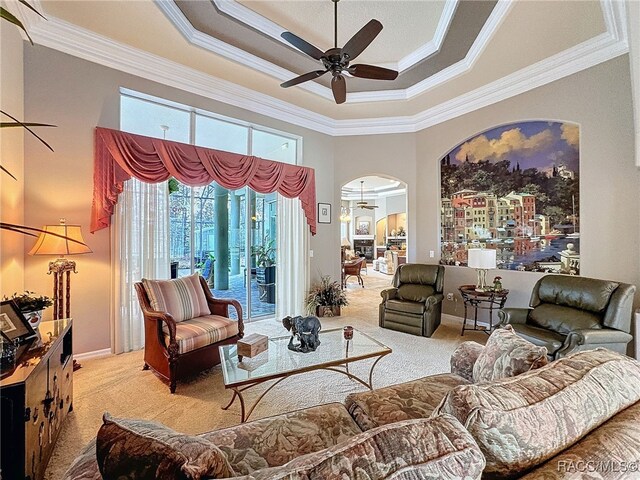4339 N Canarywood Ter, Beverly Hills, FL 34465 - living room featuring crown molding, light colored carpet, and ceiling fan