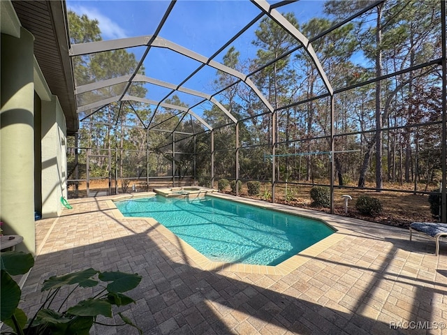 4339 N Canarywood Ter, Beverly Hills, FL 34465 - view of pool with an in ground hot tub, a lanai, and a patio area