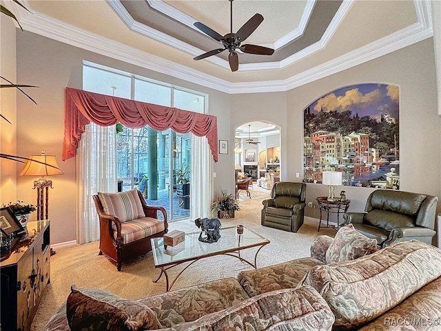 4339 N Canarywood Ter, Beverly Hills, FL 34465 - living room featuring light carpet, ornamental molding, and ceiling fan