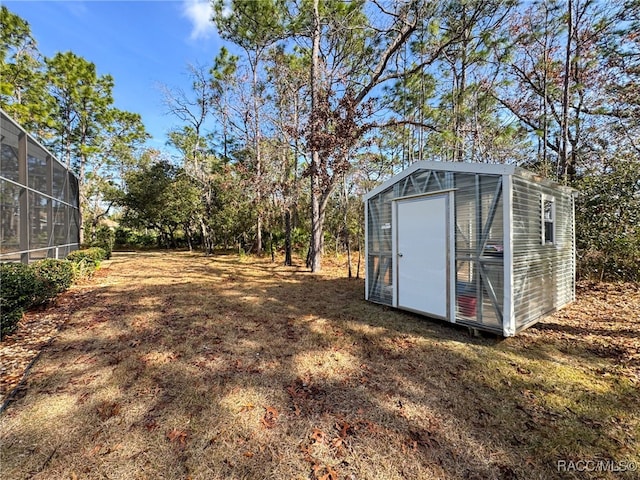 4339 N Canarywood Ter, Beverly Hills, FL 34465 - exterior space with a storage unit