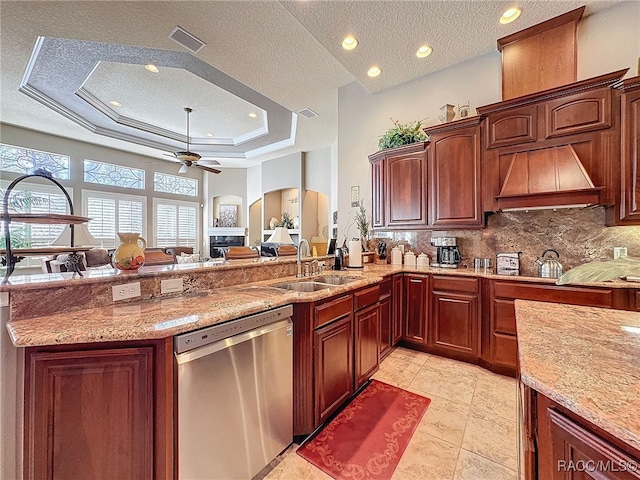 4339 N Canarywood Ter, Beverly Hills, FL 34465 - kitchen with sink, ceiling fan, backsplash, a tray ceiling, and stainless steel dishwasher