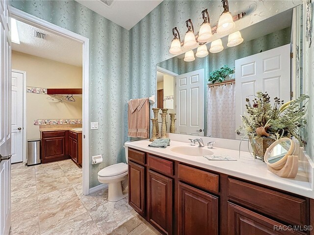 4339 N Canarywood Ter, Beverly Hills, FL 34465 - bathroom featuring vanity and toilet