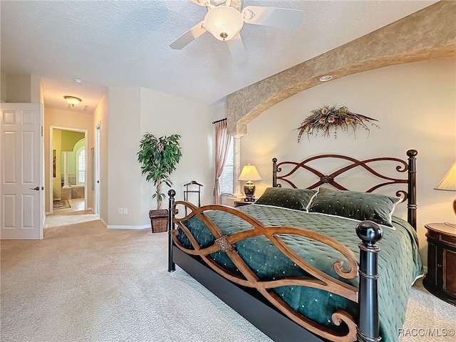 4339 N Canarywood Ter, Beverly Hills, FL 34465 - bedroom featuring ceiling fan, light colored carpet, and a textured ceiling