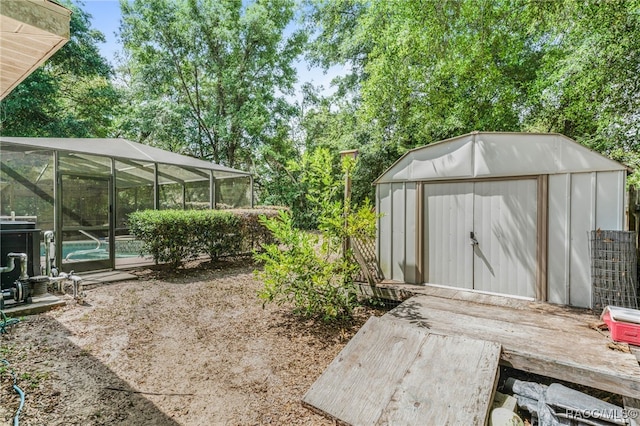 7690 N Greendale Dr, Citrus Springs, FL 34434 - view of yard with an outdoor pool, a lanai, and view of wooded area