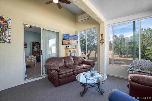 sunroom featuring an AC wall unit and ceiling fan