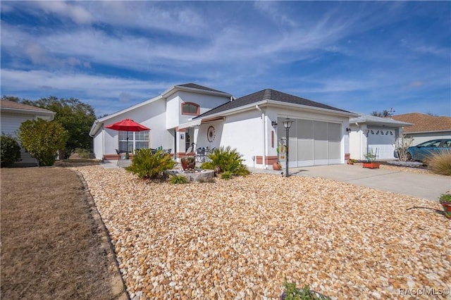 single story home with a garage