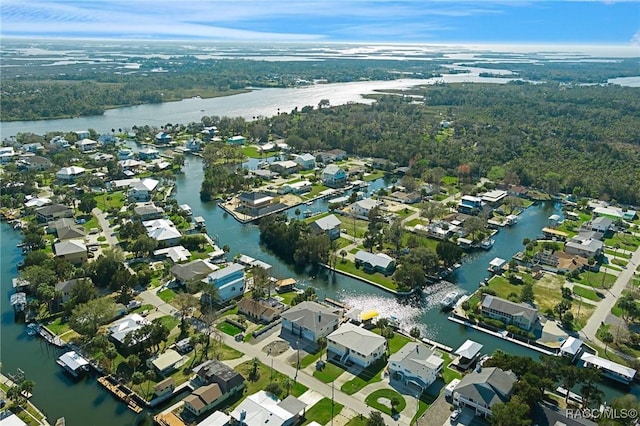 birds eye view of property featuring a residential view and a water view