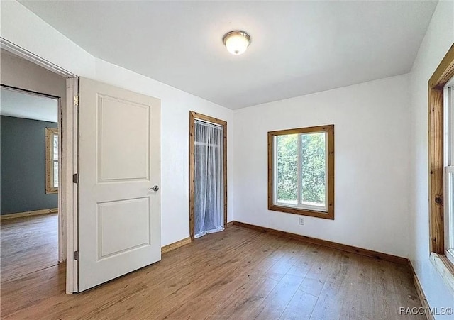 unfurnished bedroom with light hardwood / wood-style floors